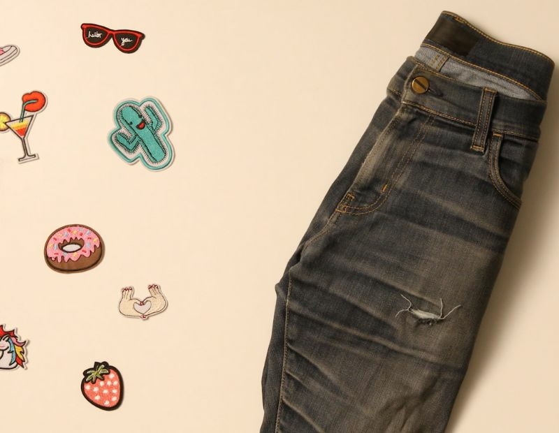 How to fix ripped jeans with fabric glue and a decorative patch