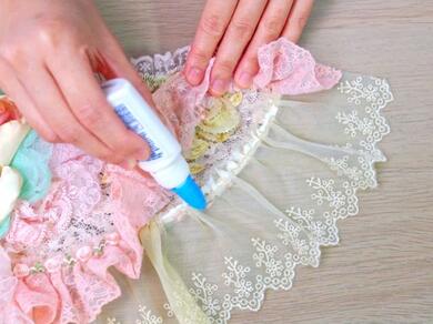 Applying Bostik Fabric Glue to lace fabric trim