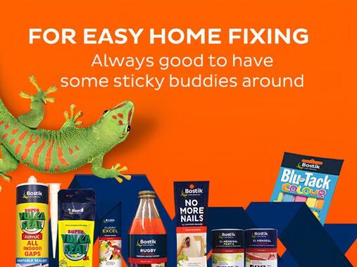 Mobile-optimized Bostik DIY promotional banner featuring the gecko mascot, home repair products, and the message “For Easy Home Fixing. Always good to have some sticky buddies around” on a bright orange background.