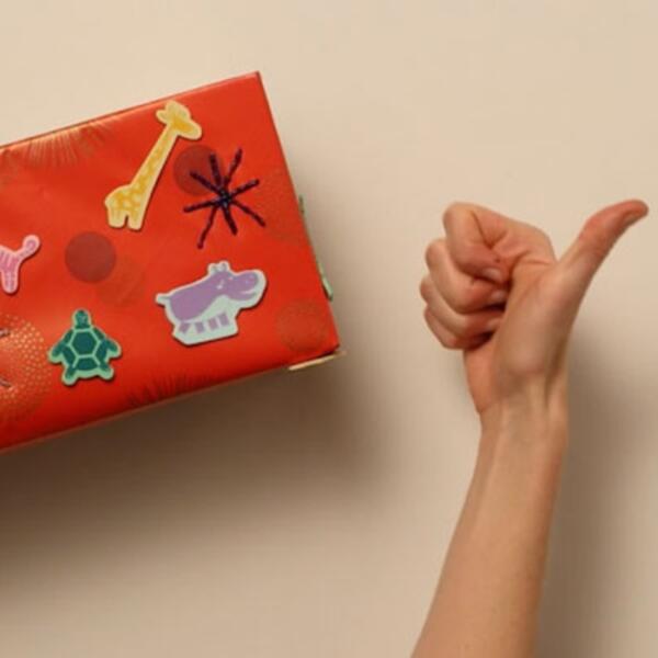 Finished decorated storage box with thumbs up